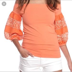 Free People “rock with it” off the shoulder top.